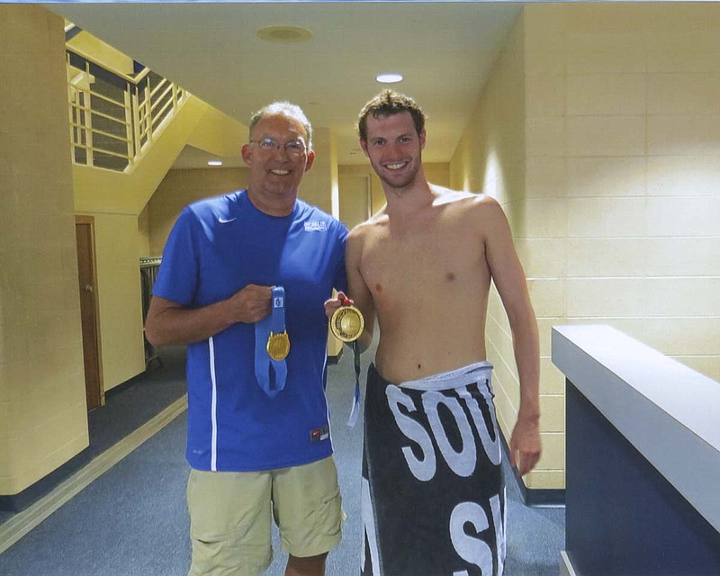 Former McCallie School standout Sean Ryan, right, poses with his two international gold medals and McCallie coach Stan Corcoran before heading to the Olympics last August. Ryan is the Greater Chattanooga Sports Hall of Fame's male athlete of the year for 2016.