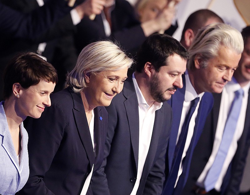 
              AfD (Alternative for Germany) chairwoman Frauke Petry, Far-right leader and candidate for next spring presidential elections Marine le Pen from France, Italian Lega Nord chief Matteo Salvini and Dutch populist anti-Islam lawmaker Geert Wilders , from left, stand together in the beginning of a meeting of European Nationalists in Koblenz, Germany, Saturday, Jan. 21, 2017. (AP Photo/Michael Probst)
            