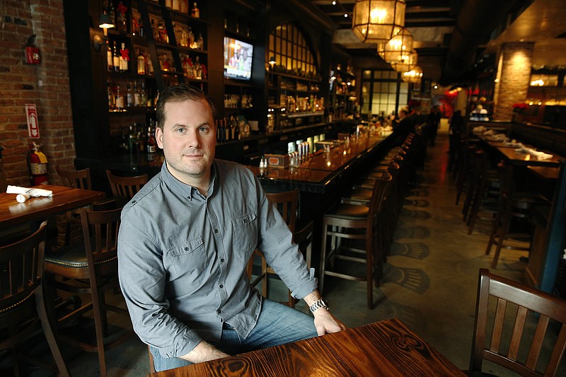 
              In this Dec. 23, 2016 photo, owner Dylan Welsh poses in Worden Hall restaurant in Boston. Welsh said Seattle Storm guard Sue Bird, of the WNBA, is a long-time friend and co-investor in his restaurants. (AP Photo/Michael Dwyer)
            