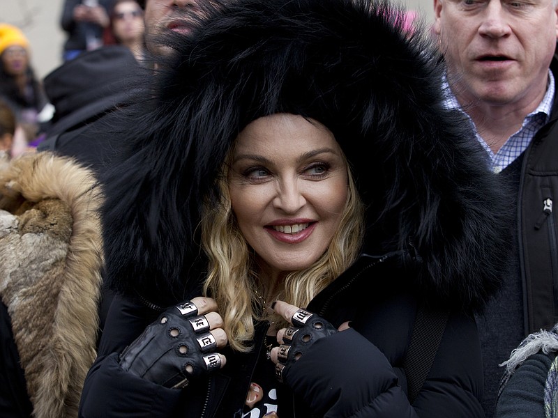 
              Madonna smiles before she performs during the Women's March on Washington, Saturday, Jan. 21, 2017 in Washington. (AP Photo/Jose Luis Magana)
            