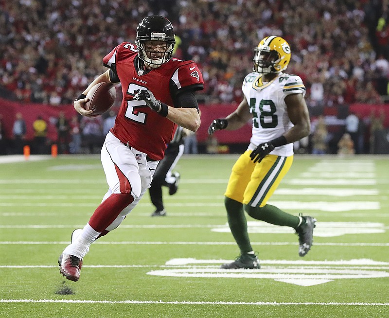 
              Atlanta Falcons' Matt Ryan runs for a touchdown during the first half of the NFL football NFC championship game against the Green Bay Packers, Sunday, Jan. 22, 2017, in Atlanta. (Curtis Compton/Atlanta Journal-Constitution via AP)
            