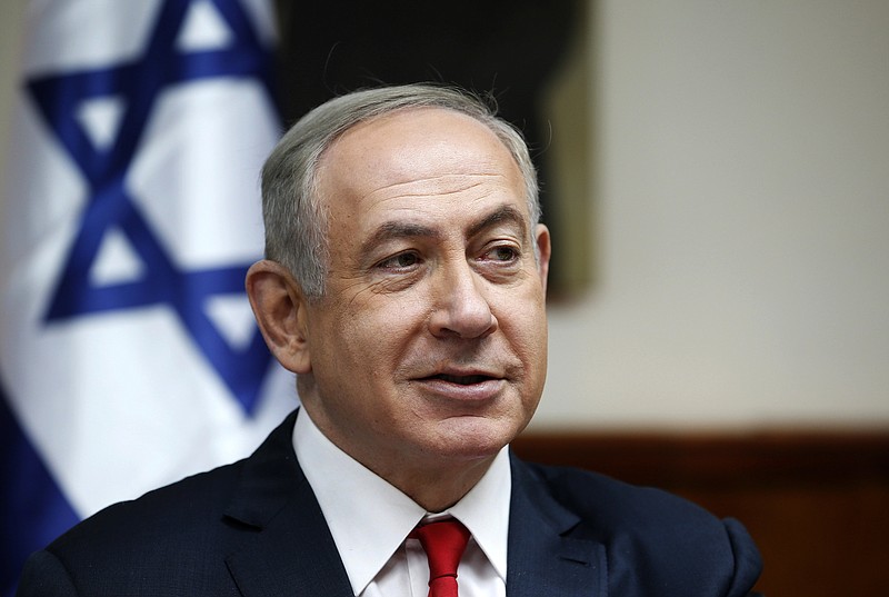 
              Israeli Prime Minister Benjamin Netanyahu attends the weekly cabinet meeting in Jerusalem, Sunday, Jan. 22, 2017. (Ronen Zvulun/Pool Photo via AP)
            