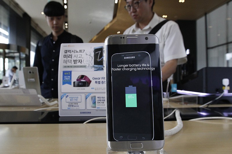 
              FILE - In this Sept. 2, 2016 file photo, a Samsung Electronics' Galaxy Note 7 smartphone is displayed at the headquarters of South Korean mobile carrier KT in Seoul, South Korea. Samsung Electronics Co. said Monday, Jan. 23, 2017, that problems with the design and manufacturing of batteries in its Galaxy Note 7 smartphones caused them to overheat and burst into fire. (AP Photo/Ahn Young-joon, File)
            