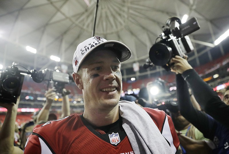 Atlanta Falcons' Matt Ryan walks off the field after the NFL football NFC championship game against the Green Bay Packers, Sunday, Jan. 22, 2017, in Atlanta. The Falcons won 44-21 to advance to Super Bowl LI. (AP Photo/David Goldman)

