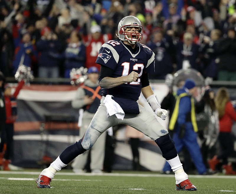 New England Patriots quarterback Tom Brady reacts after throwing a touchdown pass to Julian Edelman during the second half of the AFC championship NFL football game against the Pittsburgh Steelers, Sunday, Jan. 22, 2017, in Foxborough, Mass. (AP Photo/Matt Slocum)

