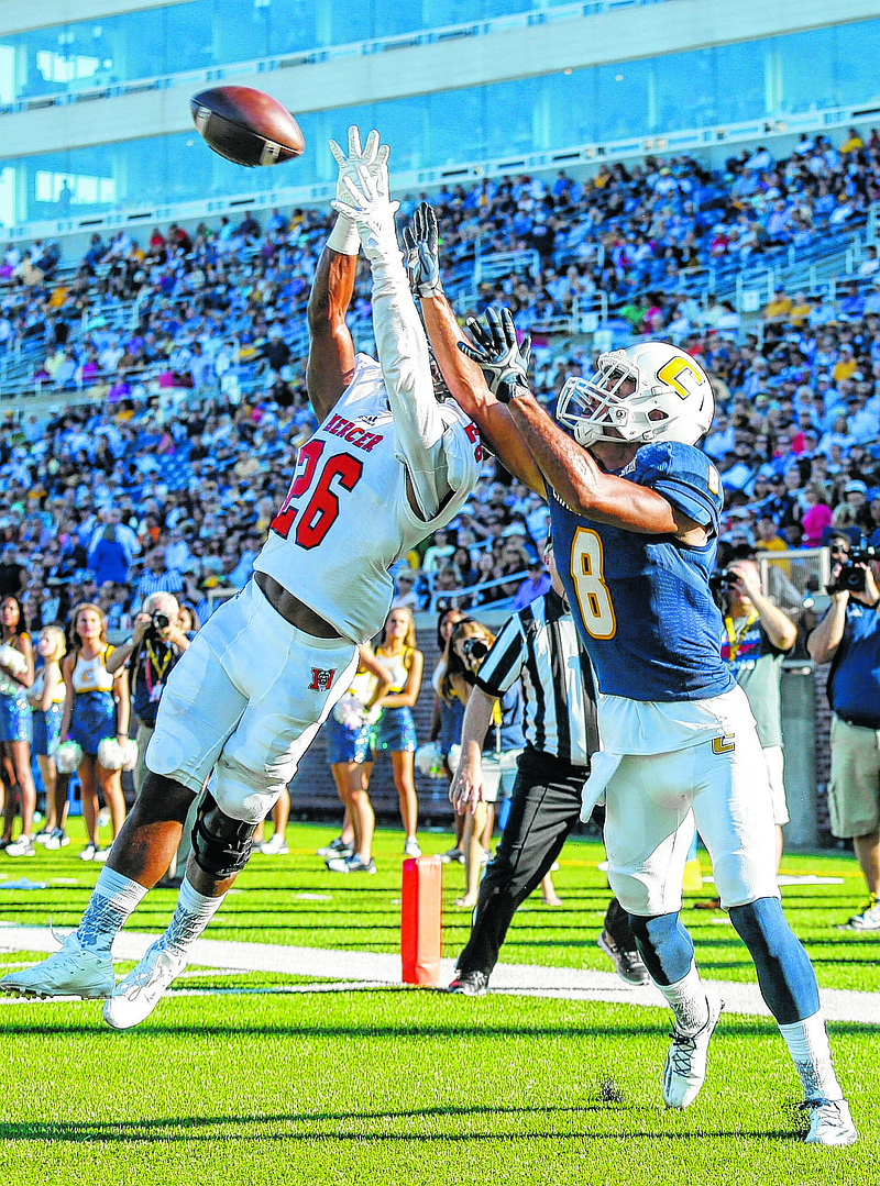Mercer defensive back Jeremy James defends a pass to UTC wide receiver C.J. Board in the end zone during the Mocs' home football game against the Mercer Bears at Finley Stadium on Saturday, Oct. 8, 2016, in Chattanooga, Tenn.
