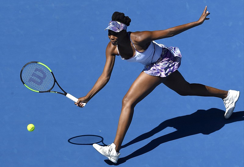 
              United States' Venus Williams makes a forehand return to Russia's Anastasia Pavlyuchenkova during their quarterfinal at the Australian Open tennis championships in Melbourne, Australia, Tuesday, Jan. 24, 2017. (AP Photo/Andy Brownbill)
            