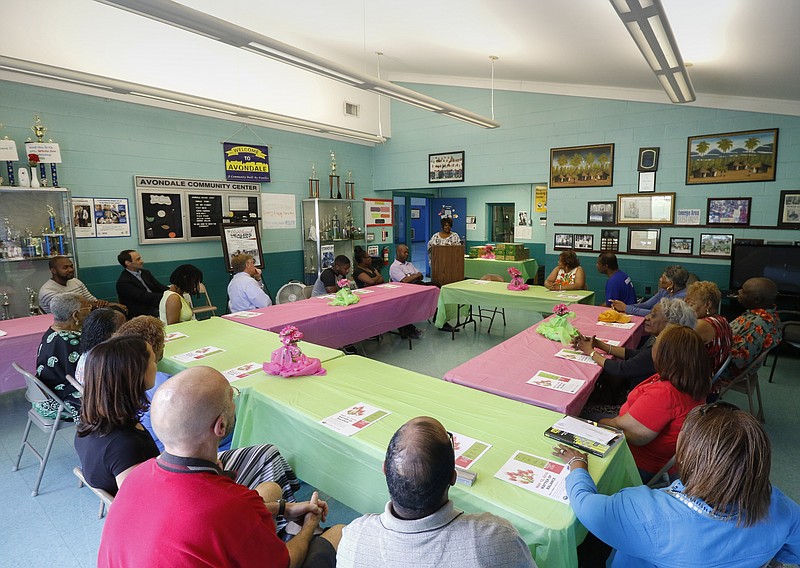 Monica Burke speaks during a luncheon about a class for seniors educating them on how to prevent falls and what to do in case they happen while at the Avondale Youth and Family Development Center on Thursday, May 12, 2016.