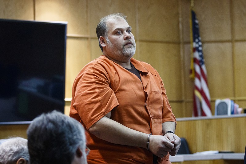 Michael Mitchell, 39, of Dallas, Texas, appears in Judge Christie M. Sell's courtroom at the City-County Courts Building on Tuesday, Jan. 17, 2017, in Chattanooga, Tenn. Mitchell has been charged along with Christine Thompson, 30, of Hollywood, Texas, in what Chattanooga police believe is a multi-state scam to steal brass from shooting ranges.