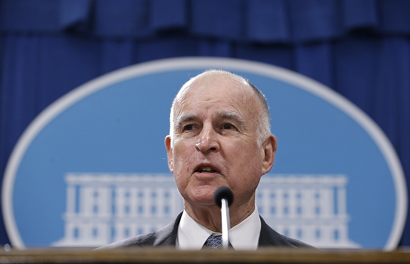 
              FILE - In this Jan. 10, 2017, file photo, California Gov. Jerry Brown discusses his 2017-2018 state budget plan he released at a news conference in Sacramento, Calif.  Brown is coming off a blockbuster year of liberal wins on climate change, minimum wage, gun control and two of his pet projects, sentencing reform and high-speed rail. But he delivers his State of the State address Tuesday, Jan. 24  in a time of uncertainty for California and to a Legislature that's in a defensive posture after the election of President Donald Trump.  (AP Photo/Rich Pedroncelli, File)
            