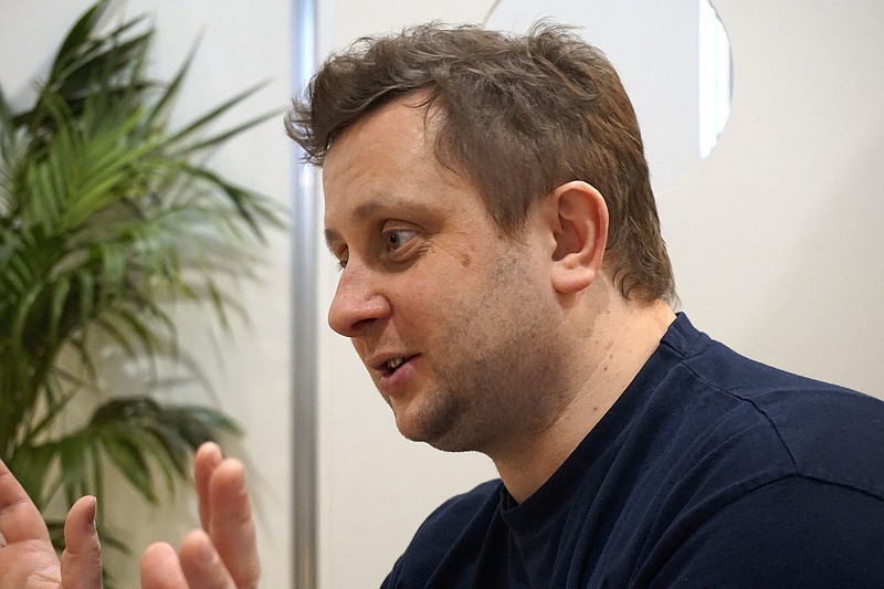 
              Octave Klaba, the founder of French internet hosting firm OVH, speaks to a journalist at a cybersecurity conference in Lille, northern France, Tuesday Jan. 24, 2017. French authorities say they've ordered the blockage or removal of more than 2,700 websites in 2016, a move Klaba thinks will do little to stifle online extremism. (AP Photo/Raphael Satter)
            