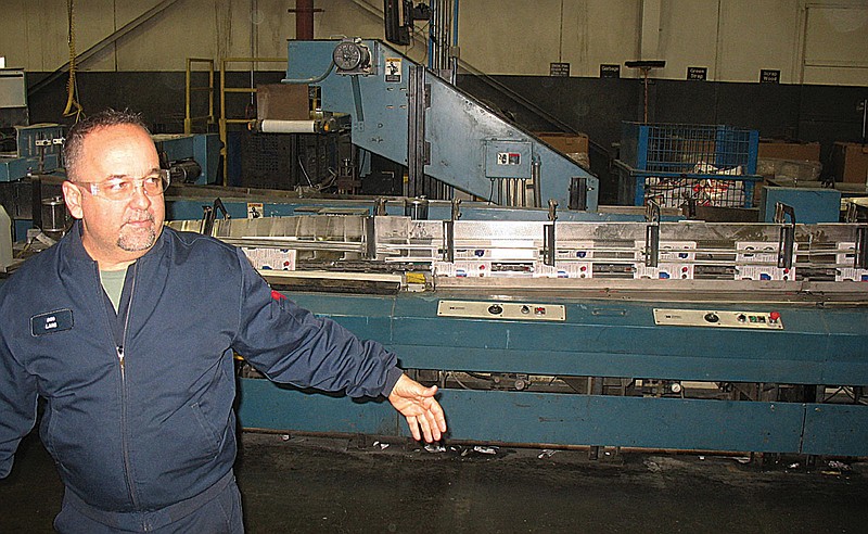 
              In this Tuesday, Jan. 24, 2017, photo, Bob Lang shows a machine that helps get a magazine ready for binding at the Quad/Graphics plant in Lomira, Wis. For more than 20 years, the plant has printed the Super Bowl program. (Nicholas Dettmann/West Bend Daily News via AP)
            