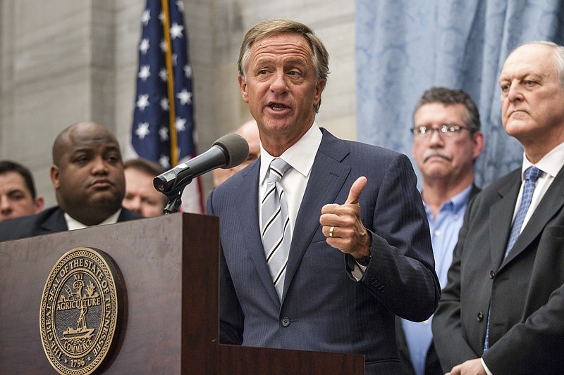 Republican Gov. Bill Haslam speaks at the state Capitol in Nashville, Tenn., on Wednesday, Jan. 18, 2017, about his plan to boost transportation funding while also cutting taxes. Haslam's plan would hike gas taxes by 7 cents per gallon. (AP Photo/Erik Schelzig)