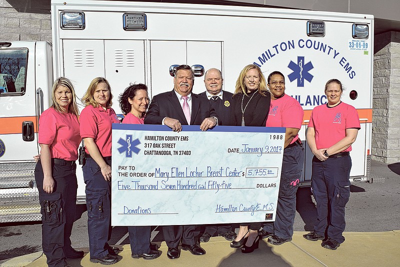 HCEMS makes a donation to MaryEllen Locher Breast Center at CHI Memorial. Pictured from left to right are Paramedics Crystal Johnson, Lt. Brandy Rogers Patrice Schermerhorn, Hamilton County Mayor Jim Coppinger, HCEMS Deputy Chief John Combes, Memorial Foundation President Jennifer Nicely, Paramedics Leah Butcher and Tracie Shannon.