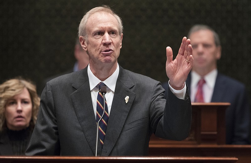 
              FILE - In this Jan. 25, 2017 file photo, Illinois Gov. Bruce Rauner delivers his State of the State address in the Illinois House chamber in Springfield, Ill. With crises mounting around him and potential Democratic rivals circling, Illinois Gov. Bruce Rauner's strategy for keeping his job in 2018 appears to involve stressing the bright spots and blaming others for the things going horribly wrong. (Ted Schurter/The State Journal-Register via AP)
            