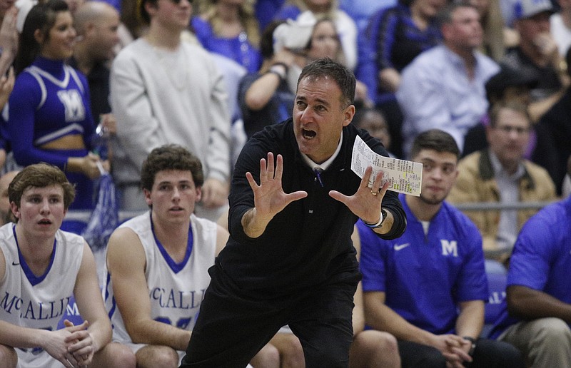 McCallie coach John Shulman directs players during their prep basketball game at McCallie School on Friday, Jan. 27, 2017, in Chattanooga, Tenn. 