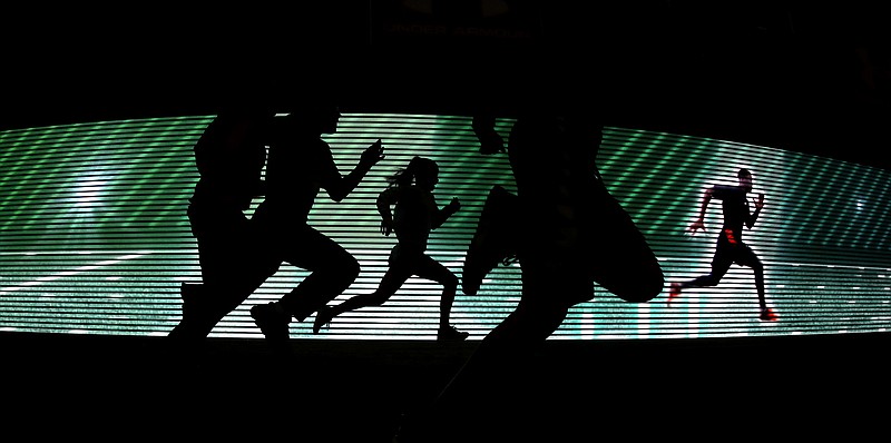 
              Fans run the 40-yard dash at the NFL Experience Saturday, Jan. 28, 2017, in Houston. The New England Patriots will play the Atlanta Falcons in Super Bowl LI Sunday, Feb. 5, 2017, at NRG Stadium in Houston. (AP Photo/David J. Phillip)
            