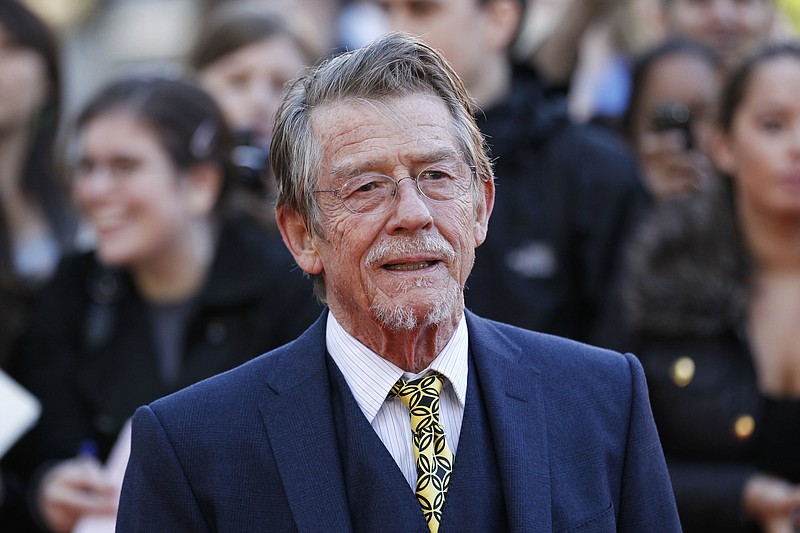 
              File - This Sep. 13, 2011, shows British actor and cast member John Hurt arriving for the UK film premiere of "Tinker Tailor Soldier Spy" at the BFI Southbank in London. The great and versatile actor Hurt, who could move audiences to tears in “The Elephant Man,” terrify them in “Alien,” and spoof that very same scene in “Spaceballs,” has died at age 77.  Hurt, who battled pancreatic cancer, passed away Friday, Jan. 27, 2017, in London according to his agent Charles McDonald. (AP Photo/Sang Tan, File)
            