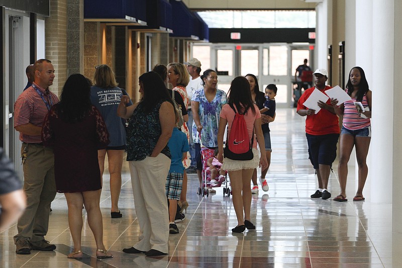 Parents, teachers and students attend a school registration at Red Bank Middle School. The city of Red Bank is considering creating its own school district.