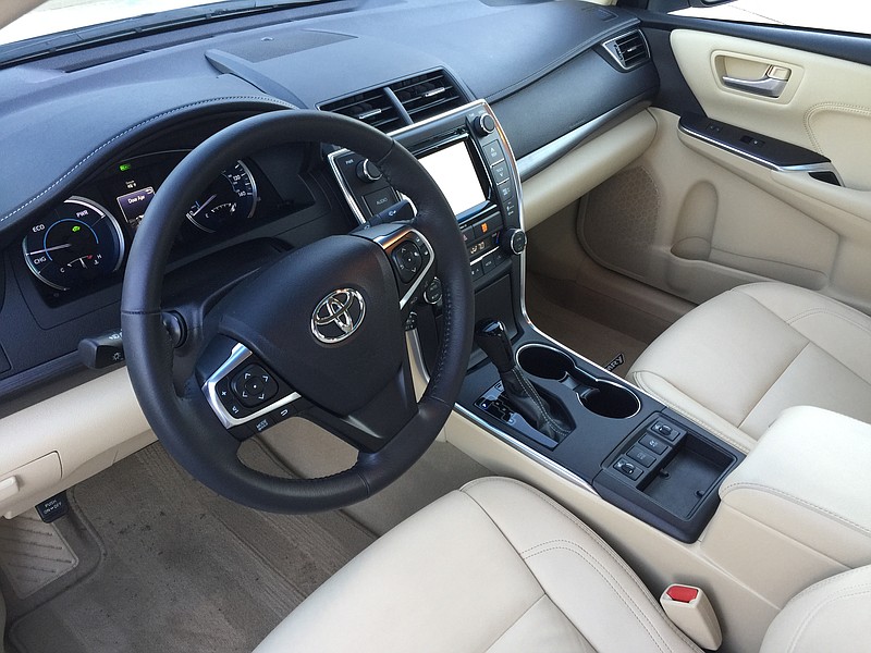 The interior of the Camry Hybrid is tastefully upscale.