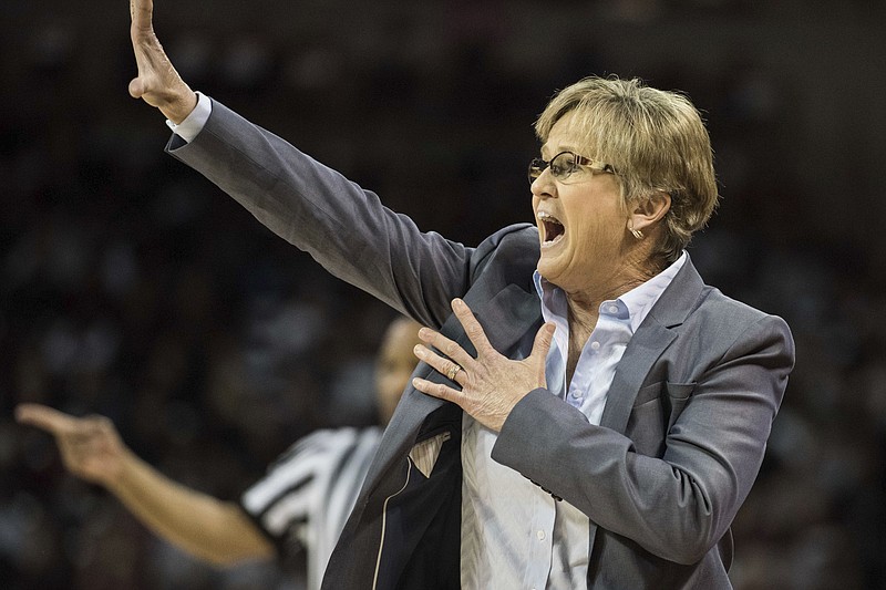 Tennessee head coach Holly Warlick communicates with players during the first half of an NCAA college basketball game against South Carolina, Monday, Jan. 30, 2017, in Columbia, S.C. (AP Photo/Sean Rayford)