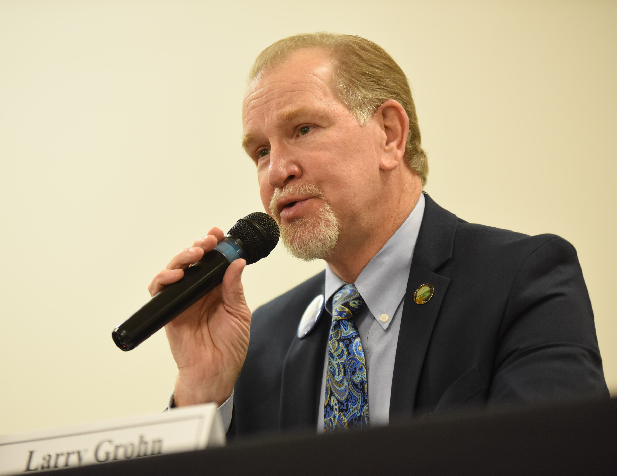 Mayoral candidate Larry Grohn speaks to a large crowd answering questions Monday night at the first of two forums. The National Coalition of 100 Black Women, Chattanooga Chapter, INC. sponsored the forum at the Greater Tucker Missionary Baptist Church on N. Moore Road in Brainerd.