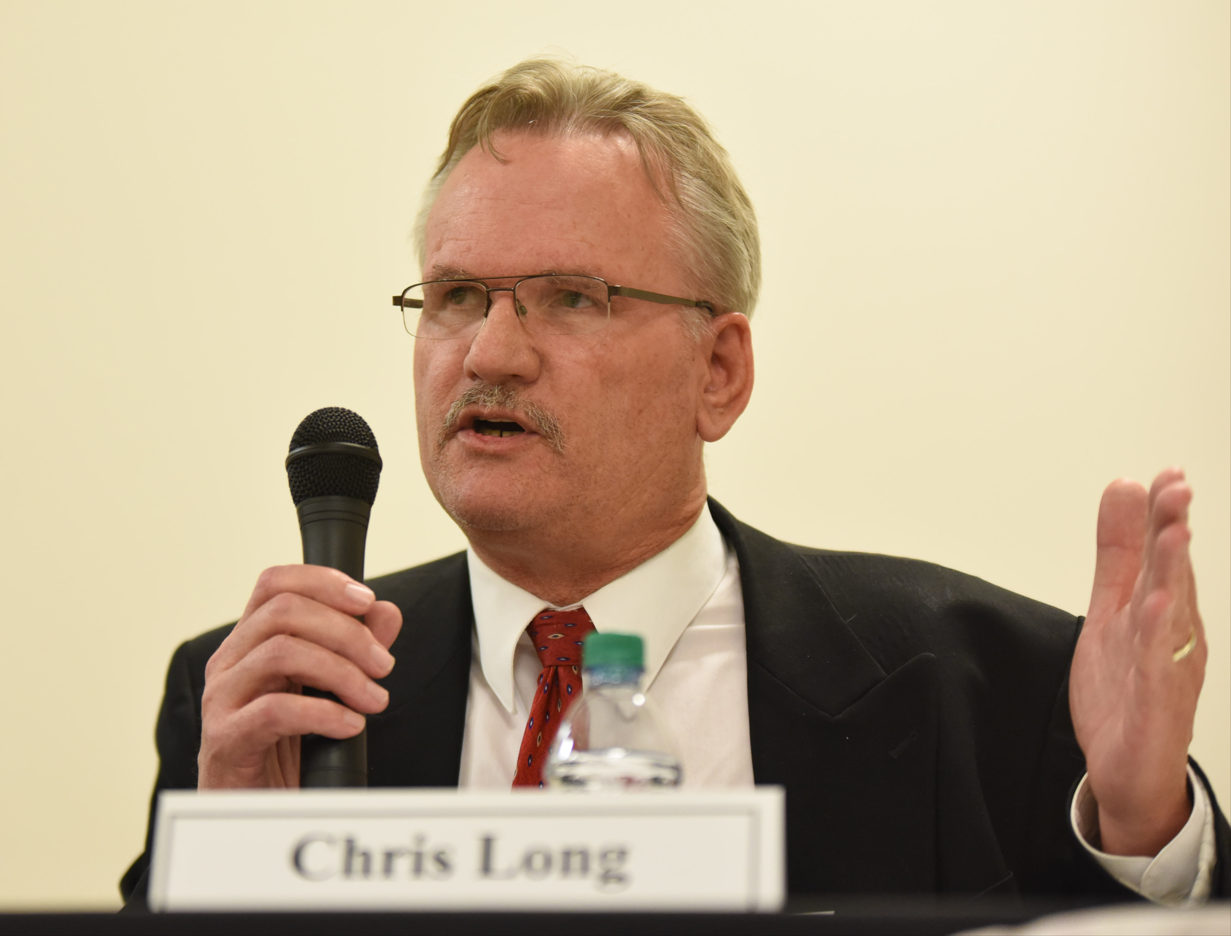Mayoral candidate Chris Long speaks to a large crowd answering questions Monday night at the first of two forums. The National Coalition of 100 Black Women, Chattanooga Chapter, INC. sponsored the forum at the Greater Tucker Missionary Baptist Church on N. Moore Road in Brainerd.
