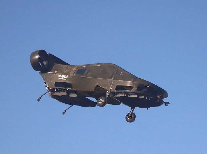
              This image provided by Urban Aeronautics/Tactical Robotics shows an Israeli-made flying car. Urban Aeronautics conducted flight tests of its passenger-carrying drone call the Cormorant in Megiddo, Israel, late in 2016. The company says the aircraft can fly between buildings and below power lines, attain speeds up to 115 mph, stay aloft for an hour and carry up to 1,100 pounds. (Urban Aeronautics/Tactical Robotics via AP)
            