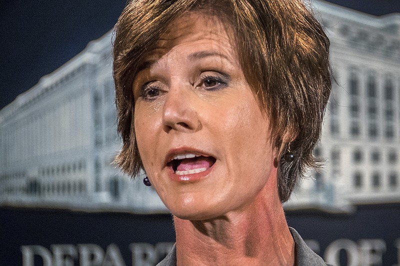 In this June 28, 2016, file photo, then-Deputy Attorney General Sally Yates speaks at the Justice Department in Washington. On Monday, Jan. 30, 2017, President Donald Trump fired acting Attorney General Sally Yates after she ordered Justice Department lawyers to stop defending refugee ban. (AP Photo/J. David Ake, File)