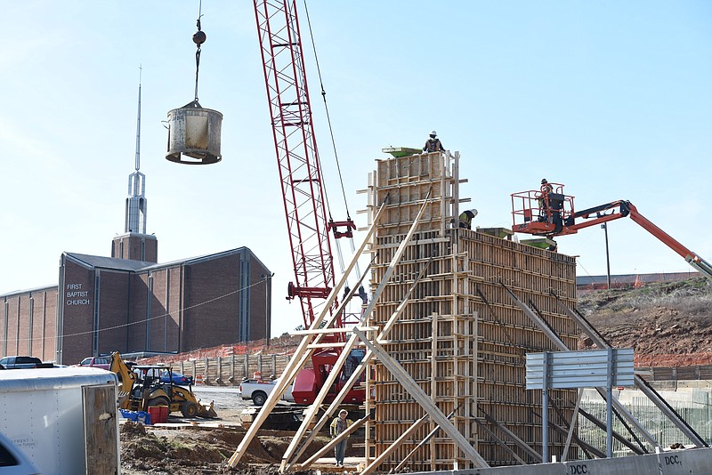 The first concrete wall construction for U.S. Highway 27 near Cameron Hill is underway by the Dement Construction Company on the morning of Jan. 31, 2017. The exact location is within the clover loop at the Fourth Street ramps near AT&T Field.