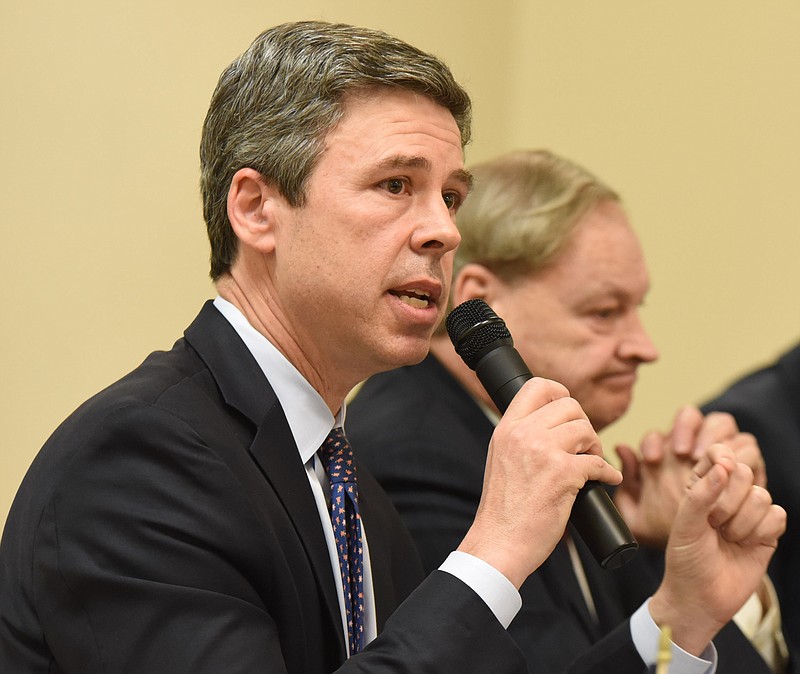 Mayor Andy Berke, addressing the Chattanooga mayoral forum at Greater Tucker Missionary Baptist Church Monday, was the frequent target of his three opponents.