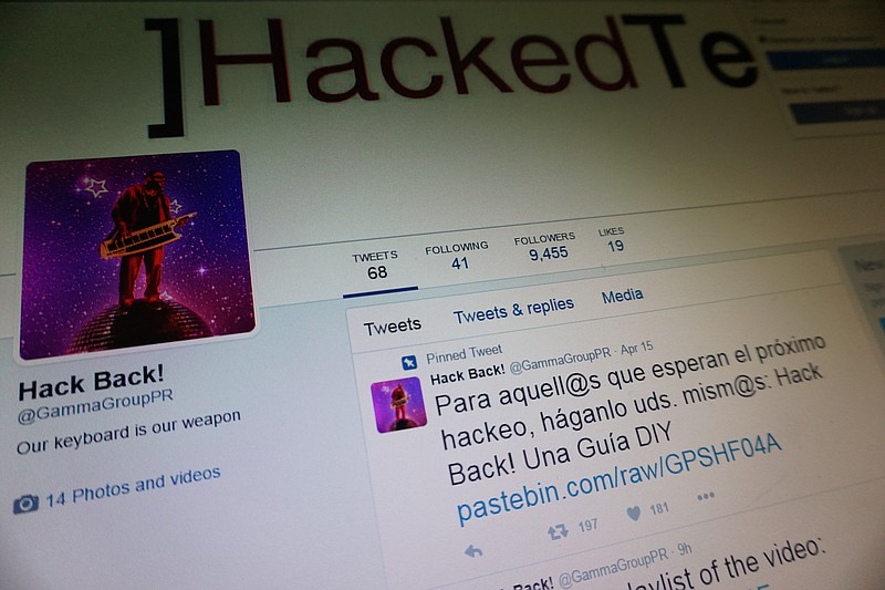 
              In this Tuesday, Jan. 31, 2017 photo,  a computer screen shows an archived copy of the Twitter feed belonging to Phineas Fisher, a hacker who claimed responsibility for breaching the union of the Mossos d'Esquadra, Catalonia's regional police, last year. Spanish police have arrested three people over a data breach linked to a series of dramatic intrusions at European spy software companies — feeding speculation that the net has closed on an online Robin Hood figure known as Phineas Fisher. (AP Photo/Raphael Satter)
            