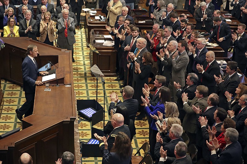 Gov. Bill Haslam, left, is applauded as he gives his annual State of the State address to a joint convention of the Tennessee General Assembly, Monday, Jan. 30, 2017, in Nashville, Tenn. (AP Photo/Mark Humphrey)