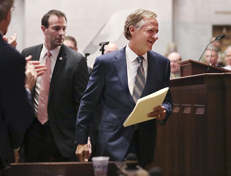 Gov. Bill Haslam arrives in the House chamber to give his annual State of the State address to a joint convention of the Tennessee General Assembly Monday, Jan. 30, 2017, in Nashville, Tenn. (AP Photo/Mark Humphrey)