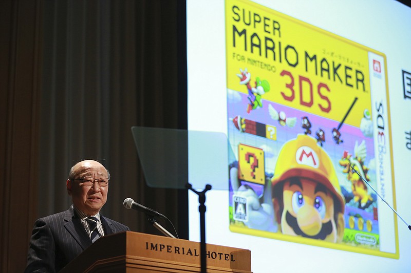 
              Japanese video game maker Nintendo Co. President Tatsumi Kimishima speaks during a news conference in Tokyo, Wednesday, Feb. 1, 2017. During the conference, Kimishima told reporters the game maker aims to sell 2 million Switch consoles in the first month after its launch on March 3. He said pre-orders were strong. (AP Photo/Eugene Hoshiko)
            