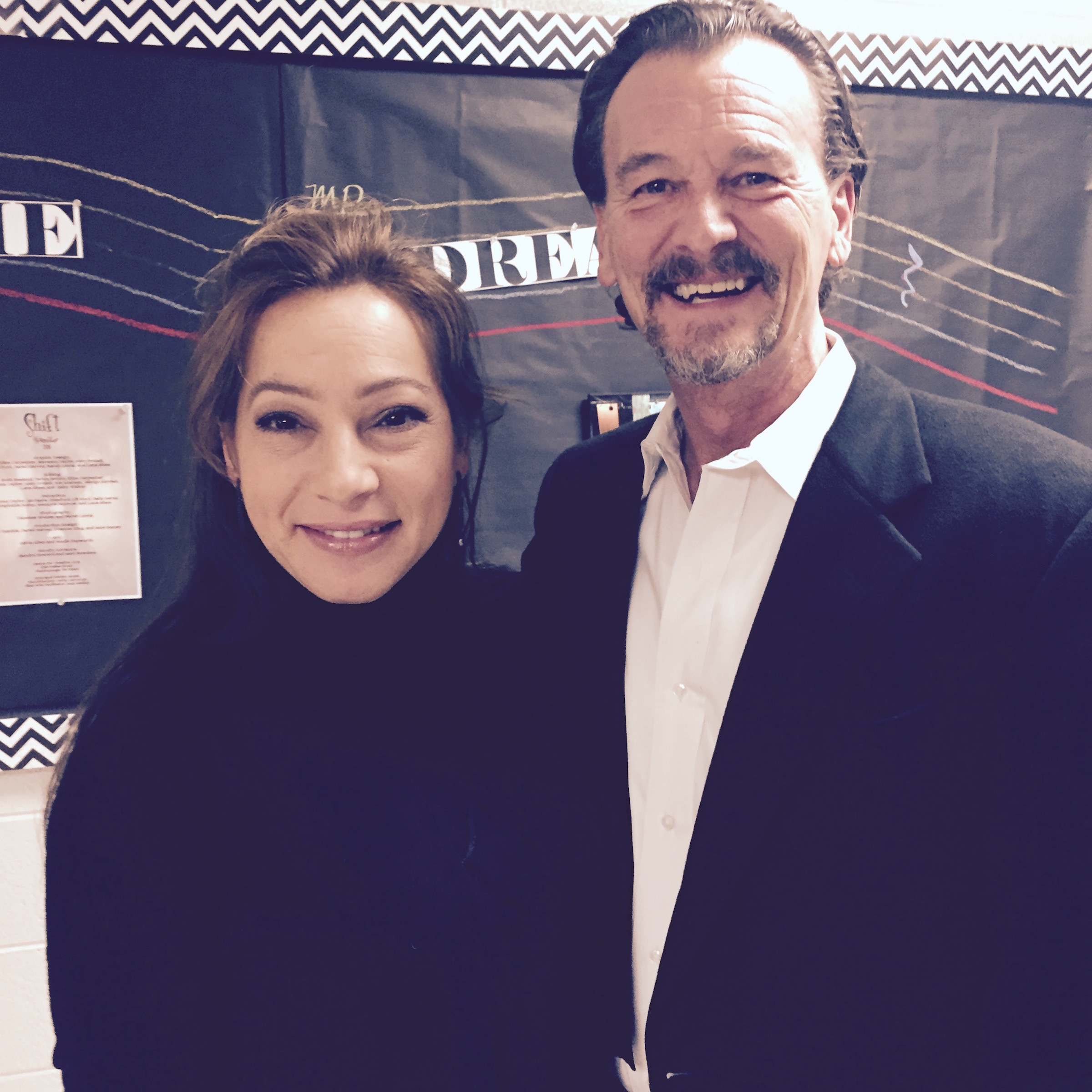 Jody Grande, left, and Bill Olive, parents of a CCA eighth-grader, attended the benefit.