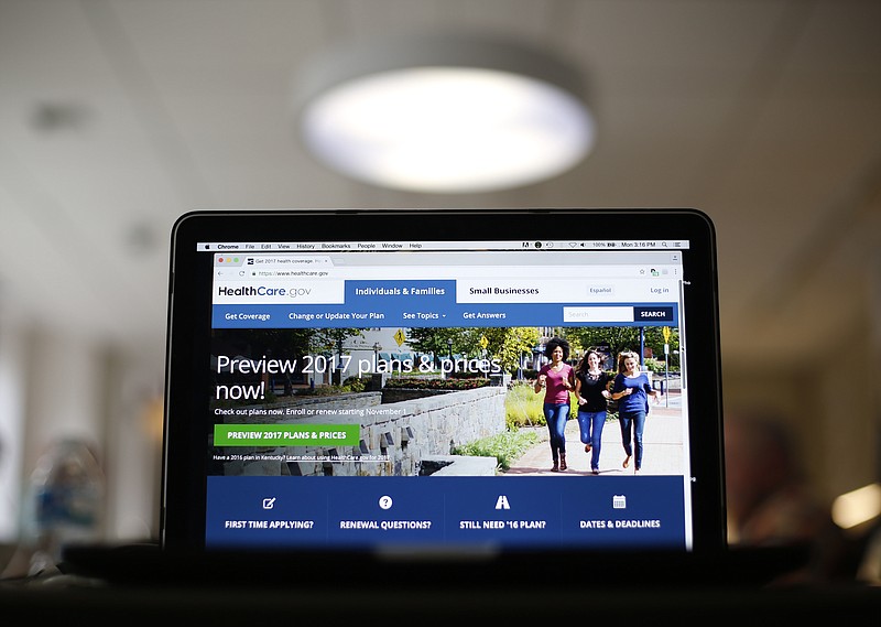 FILE - In this Oct. 24, 2016 file photo, the HealthCare.gov 2017 web site home page as seen in Washington. The government says about 9.2 million people signed up for coverage this year through HealthCare.gov, the health insurance website serving most states. (AP Photo/Pablo Martinez Monsivais, File)