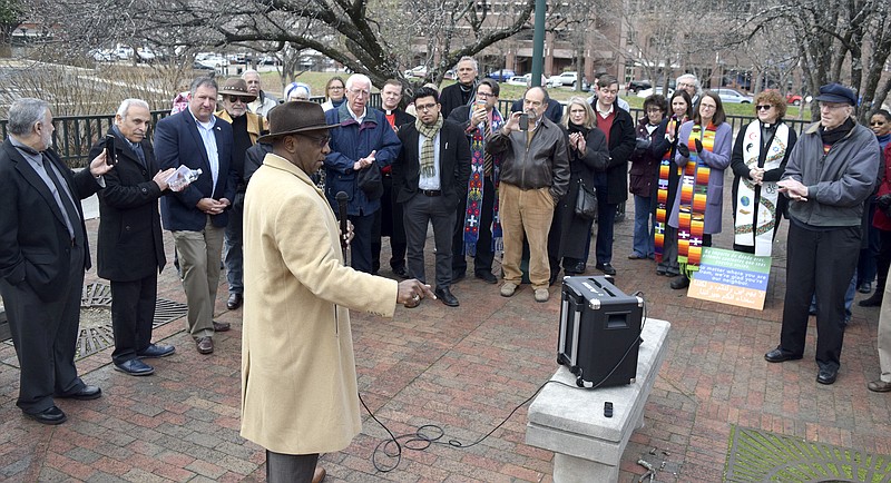 Pastor Jeffrey Wilson, of New United Baptist Church, makes a point to the gathering at Miller Park.  Faith leaders from the Chattanooga area addressed the public about President Trump's recent Executive Order on immigration on February 3, 2017.