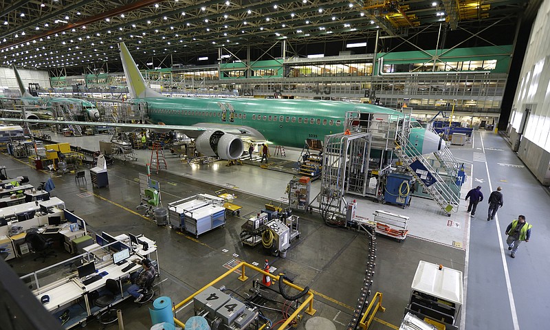 
              FILE - In this Tuesday, Dec. 16, 2014, file photo, Boeing 737-800 airplanes are on the assembly line at Boeing's 737 assembly facility in Renton, Wash. On Friday, Feb. 3, 2017, the Commerce Department reports on U.S. factory orders for December. (AP Photo/Ted S. Warren, File)
            