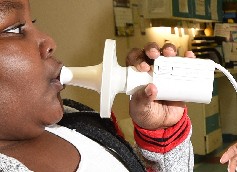 The Vitalograph unit is a digital spirometer used to measure lung function. With the latest device, clinics are helping to fight asthma in the schools.