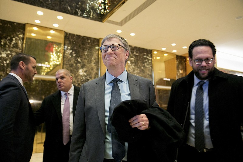Bill Gates in the lobby of Trump Tower in New York last December. Gates, one of the world's eight richest people, is on track to be the world's first trillionaire in 25 years.