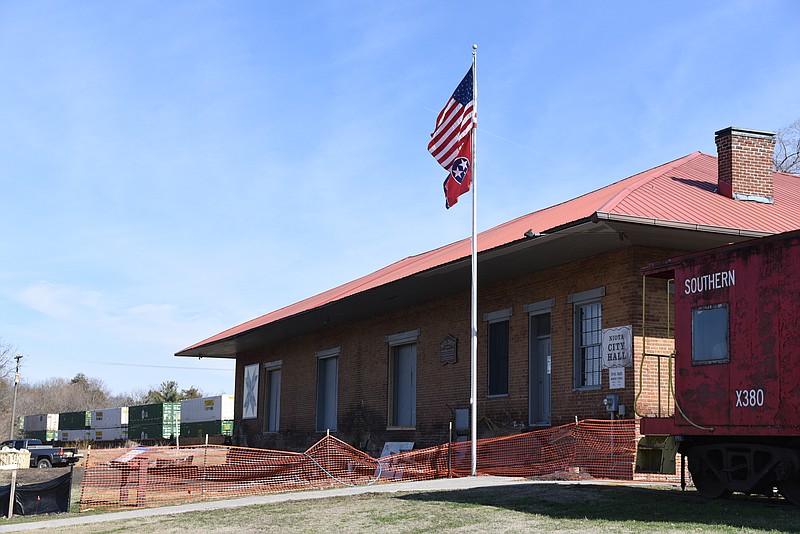 A train passes the Niota City Hall Tuesday, January 31, 2017.