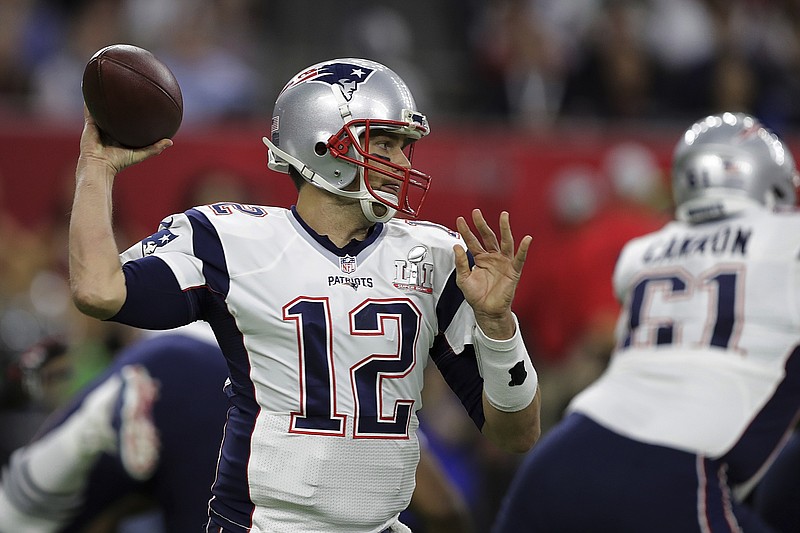 New England Patriots' Tom Brady looks to pass, during the first half of the NFL Super Bowl 51 football game against the Atlanta Falcons, Sunday, Feb. 5, 2017, in Houston. (AP Photo/Darron Cummings)