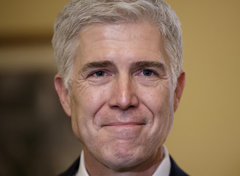 
              In this Feb. 1, 2017, photo, Supreme Court Justice nominee Neil Gorsuch pauses during a meeting on Capitol Hill in Washington. As a conservative student at Columbia University in the mid-1980s, Gorsuch was a political odd man out, and he was determined to speak up. (AP Photo/J. Scott Applewhite)
            