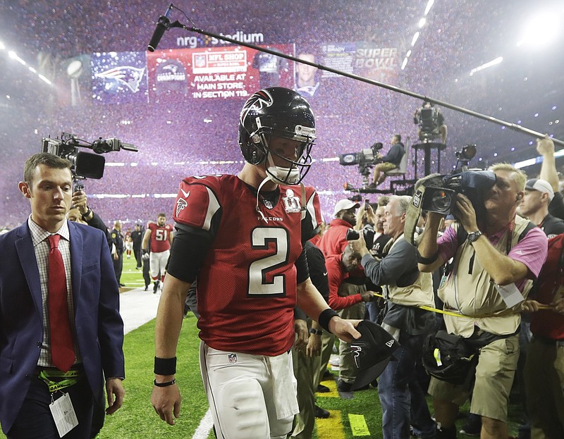 Atlanta Falcons' Matt Ryan leaves the field after their overtime loss to the New England Patriots in the NFL Super Bowl 51 football game Sunday, Feb. 5, 2017, in Houston. (AP Photo/Tony Gutierrez)