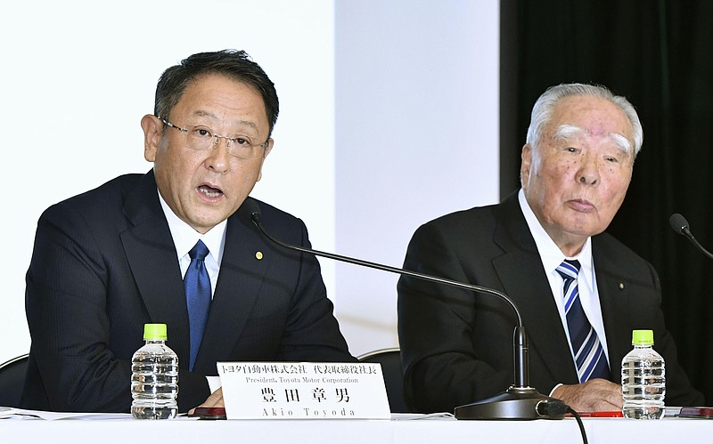 
              FILE - In this Oct. 12, 2016 file photo, Toyota Motor Corp. President Akio Toyoda, left, speaks with Suzuki Motor Corp. Chairman Osamu Suzuki during a news conference in Tokyo.  Japanese automakers Toyota and Suzuki, which began looking into a partnership in October, say they have decided to work together in ecological and safety technology — a rapidly growing area in the industry. Toyota Motor Corp., the maker of the Camry sedan, Prius hybrid and Lexus luxury models, and Suzuki Motor Corp., which specializes in tiny cars, announced the decision Monday, Feb. 6, 2017, following approval by the company boards. (Shigeyuki Inakuma/Kyodo News via AP, File)
            