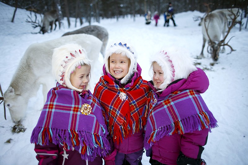 
              In this Thursday, Feb. 2, 2017 photo, Sami children, from left, Karen Seline Eira, Inga Helene Anti Persen and Leah Christine Utsi at the reindeer kindergarten in Karasjok, Norway. The indigenous people of Europe's Arctic region are celebrating the centenary of their national day this week with some 120 events planned in Norway. Monday’s start to weeklong festivities marks the centenary of the Sami people’s first congress in Trondheim, Norway, in 1917. Seventy-five years later, the Sami declared Feb. 6 their national day. (?Heiko Junge /NTB Scanpix via AP)
            