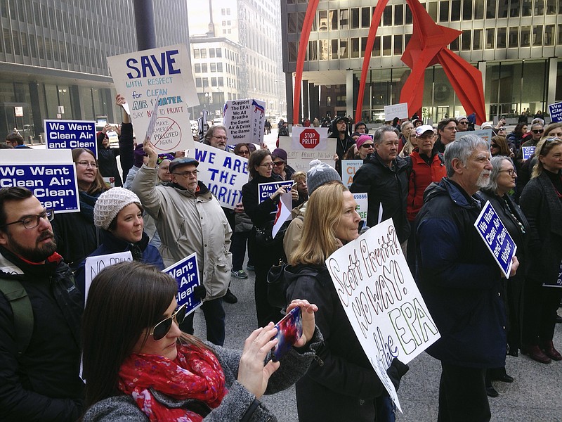 
              Environmental Protection Agency employees and environmental activists gather in Chicago, Monday, Feb. 6, 2017, to protest the nomination of Scott Pruitt for administrator of the agency. Pruitt is President Donald Trump's pick to head the agency. (AP Photo/Carla K. Johnson)
            