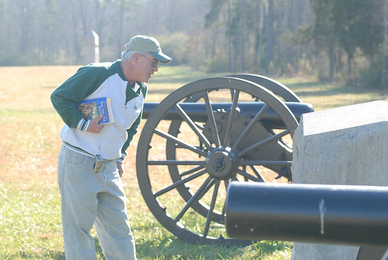 Manhattan, Mont., resident Steve Knobel examines a monument to the Indiana artillery battery led by Eli Lilly at Chickamauga Battlefield.