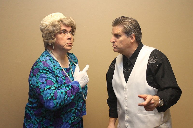 Town snob Vera Carp (Mark Oglesby) expresses her opinions to Reverend Spikes (Dennis Parker) in Signal Mountain Playhouse's "Greater Tuna."